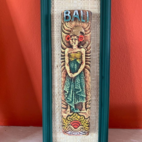 Handmade wooden frames with embossed exotic figures from Bali