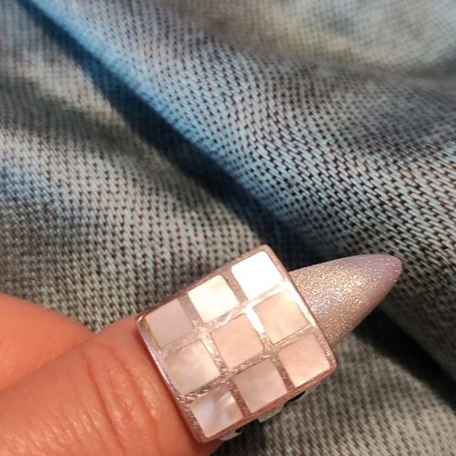 Silver ring with shells