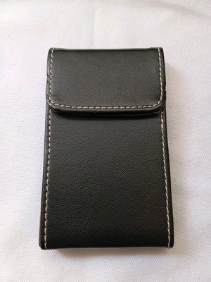 Card holder used, elegant black leather for business cards