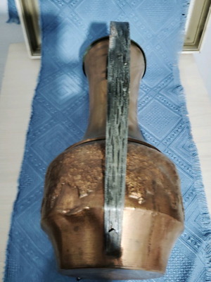Large old copper pitcher used