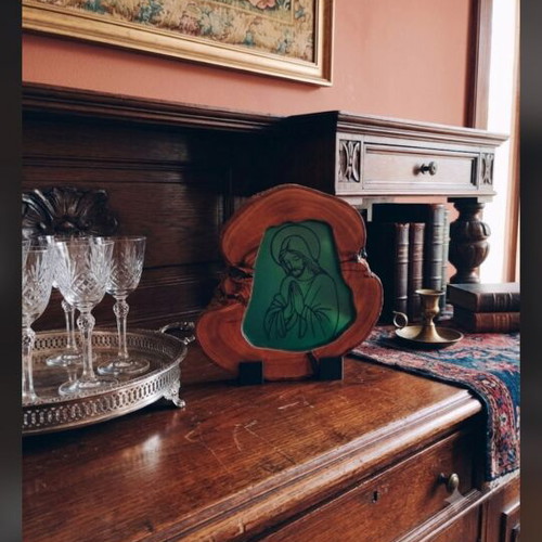 Handmade religious icon on natural wood slice with resin finish