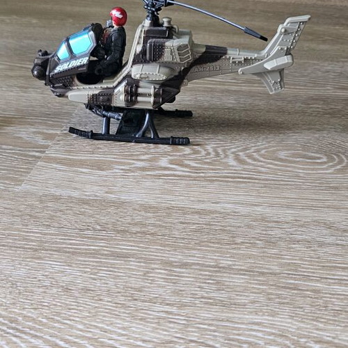Helicopter toy with 2 military figures like new