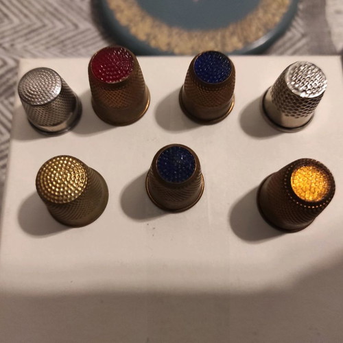 Lot of 7 vintage thimbles used