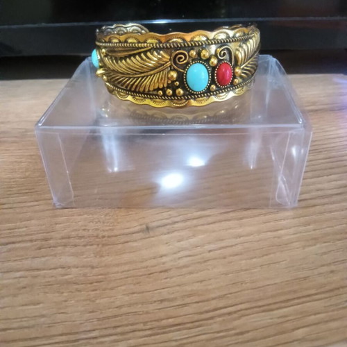 Ethnic bracelet like new, gold color with stones