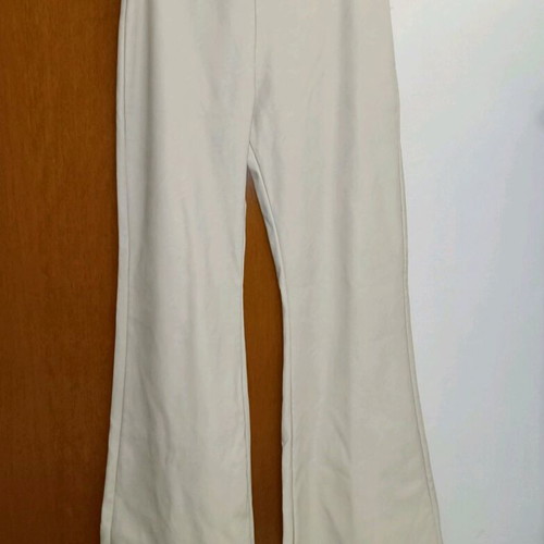 Light beige faux leather pants used with 2 small scratches