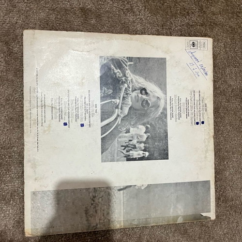 Janis Joplin Greatest Hits with visible cover wear