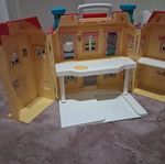 Vintage toy house with light used in good condition