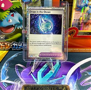 Pokemon card trainer drops in the ocean holographic classic