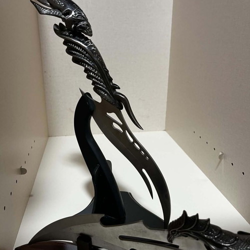Decorative knife set with ornate handles