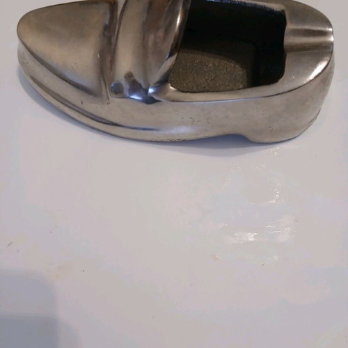 Metal ashtray in shoe shape like new