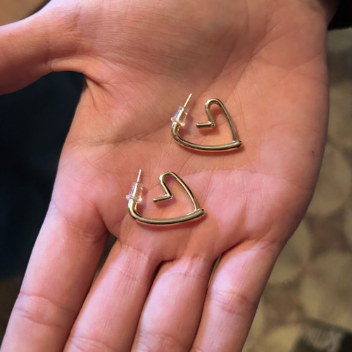 Heart-shaped earrings used, gold color