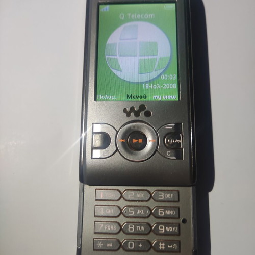 Sony Ericsson W595 slider phone, beige gold