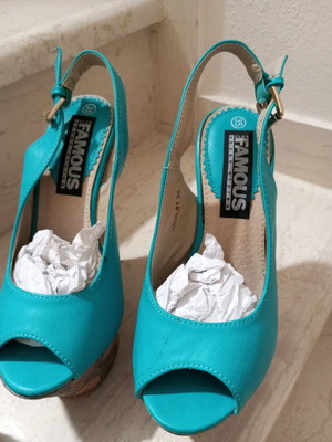 Turquoise platform shoes like new, size 35 with unique heel