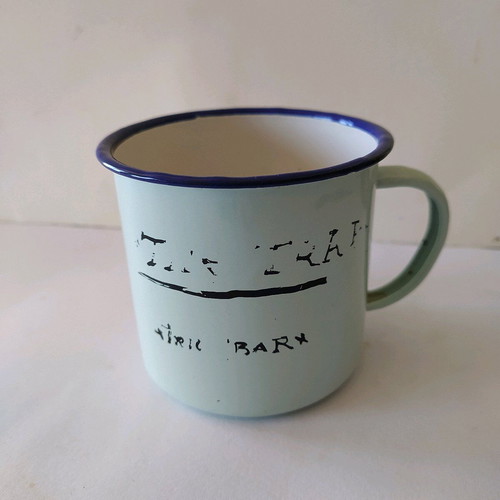 Enamel mug used, old with painted design
