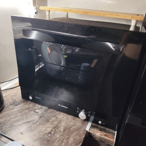 Bosch countertop dishwasher, black glass door