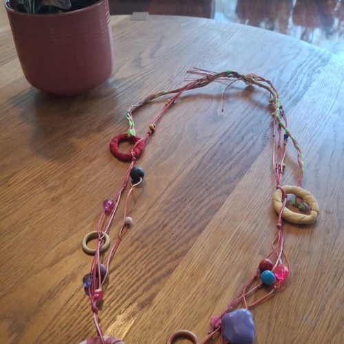 Necklace with beads, thread and fabric used, multicolored