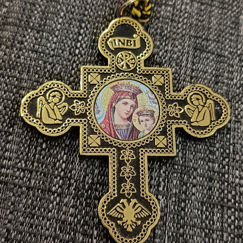 Double-sided plastic cross pendant like new