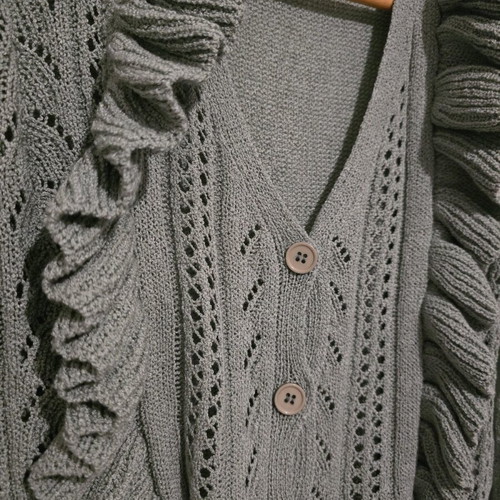 Cardigan in excellent condition, light green, one size