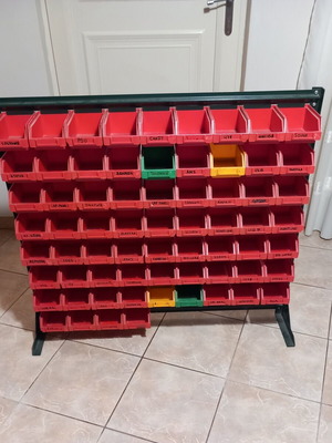 Metal stand with 67 bins used