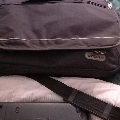 Toshiba Satellite C660D-10D laptop used with charger and accessories
