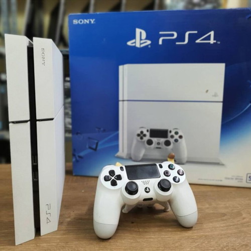 PlayStation 4 White Edition console like new with games 500GB