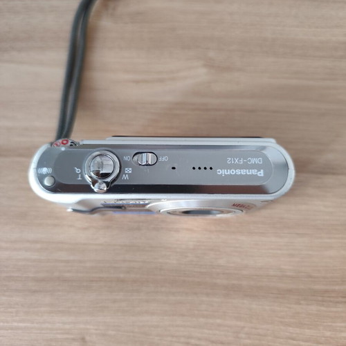 Panasonic Lumix DMC-FX12 digital camera used with accessories