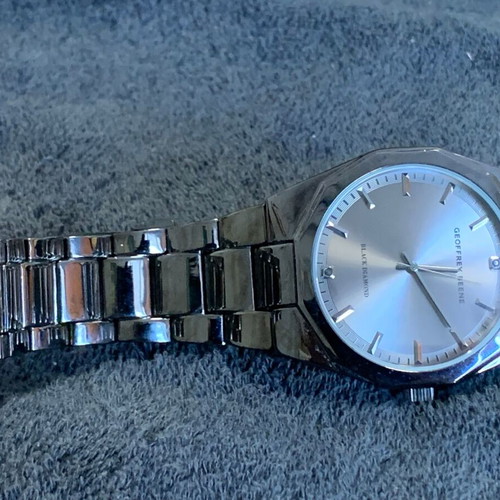 Geoffrey Beene Black Diamond men's watch used with gray dial