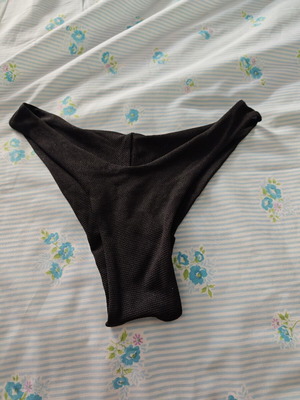 Black bikini bottom with glitter design like new, sizes S-M