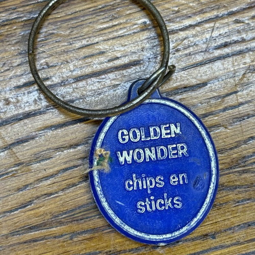 Vintage promotional keychain used from Dutch company