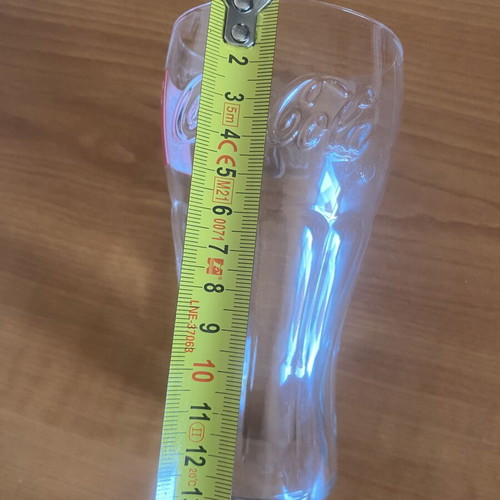 Coca-Cola collectible glass with "Παίζει Rock" logo, vintage