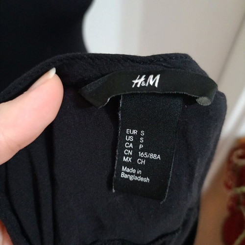 H&M black top with neckline and buttons, 3/4 sleeve, like new