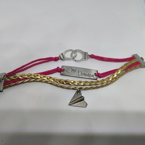 One Direction collectible bracelet like new with metal details