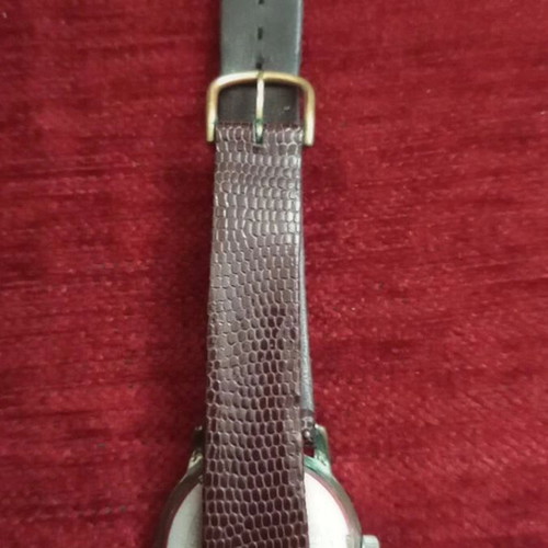 Technos vintage manual wind watch used, brown strap