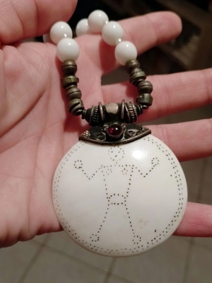 Handmade necklace with white pearls and bone charm used