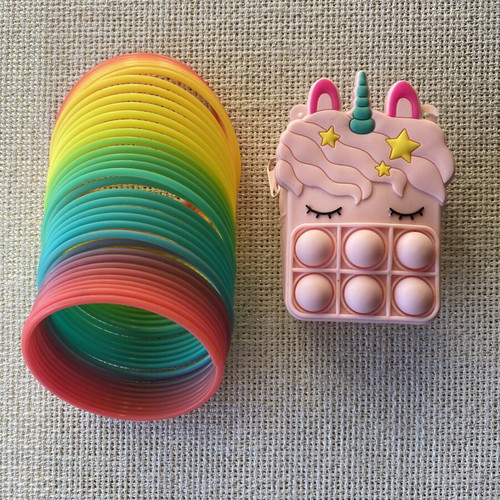 Girls' set with silicone wallet and slinky toy like new