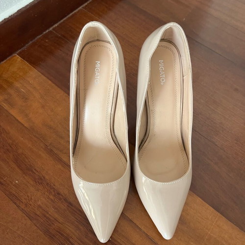 Migato women's pumps size 39 beige like new