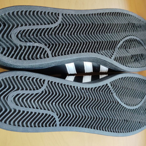 Adidas Superstar sneakers size 52.5, black and gold