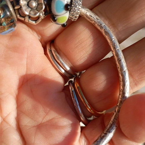 Hammered silver bracelet with Murano charms like new