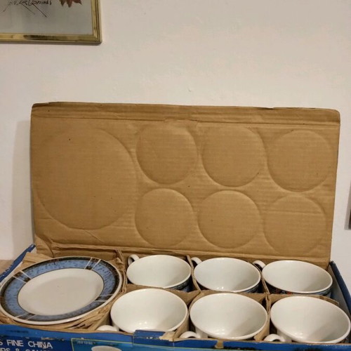 Tea set with metal base unused
