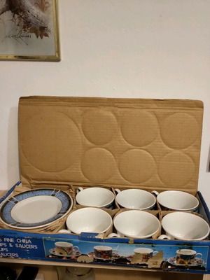 Tea set with metal base unused