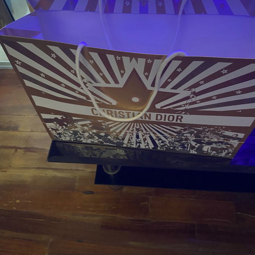 Cartier box and Dior bag with two pairs of Louboutin and Gucci cloth shoe bags used