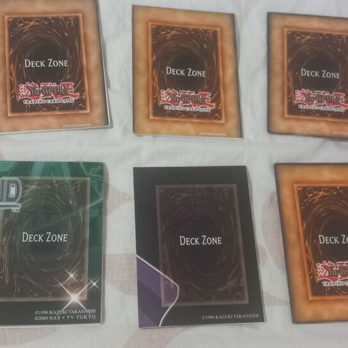 Yu-Gi-Oh! rule books and deck zones, like new, set of 14 each