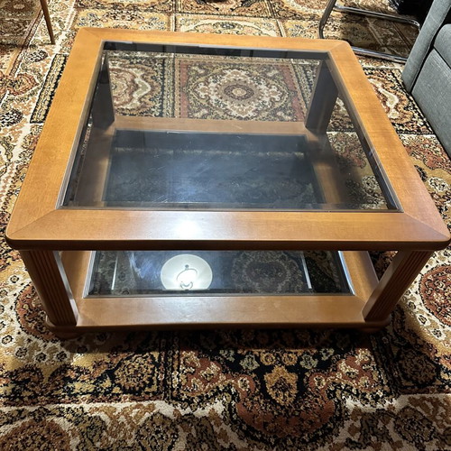 Set of two wooden square coffee tables with glass tops