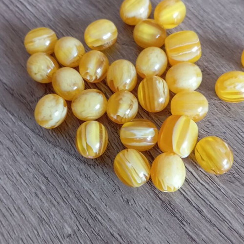 Acrylic beads mix 10mm round and 15mm barrel yellow with patterns, 26 pcs new