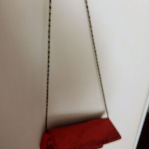 Red shoulder bag like new with black chain