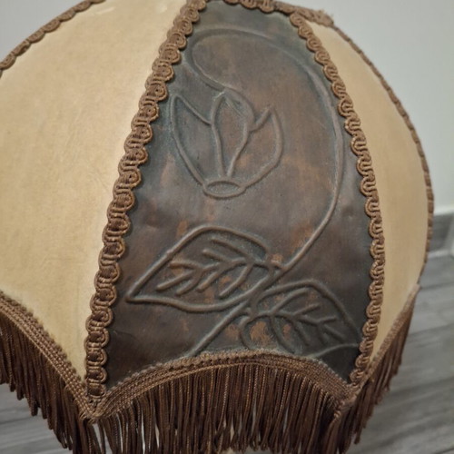 Vintage table lamp with wooden base and embossed fringed shade
