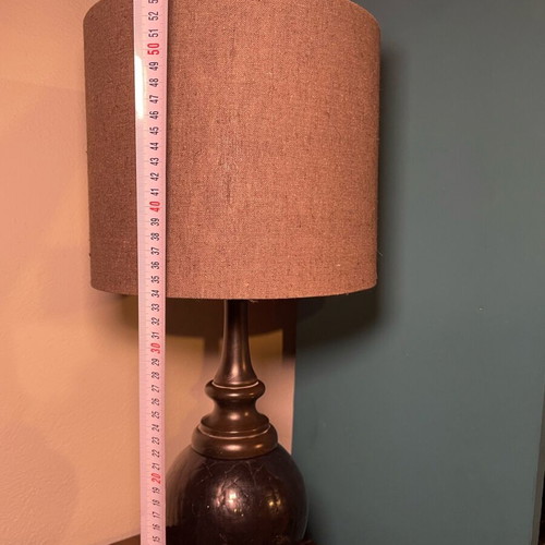 Black table lamp with glass base and gray-black shade