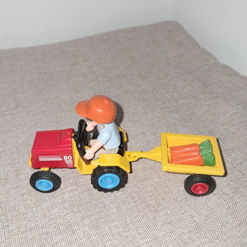Playmobil small farmer figure with tractor like new