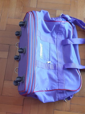Travel sack like new, expandable with wheels, purple