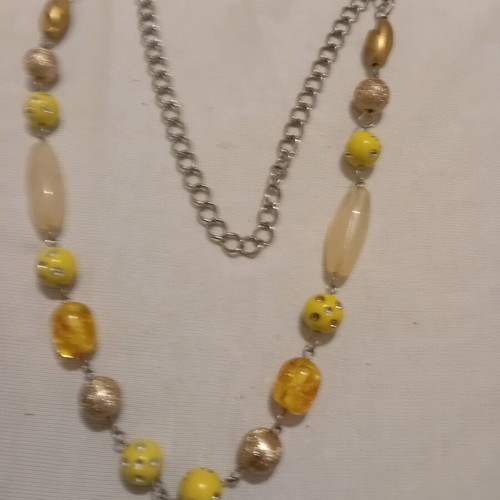 Necklace with beads in various shapes and metal chain like new